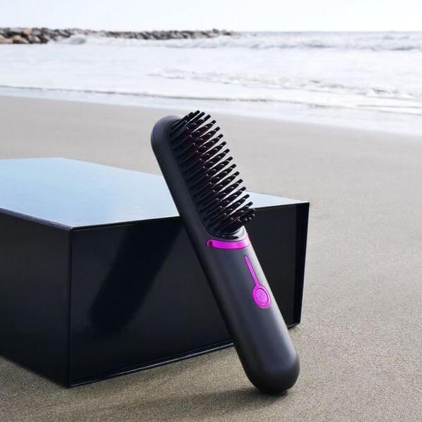 Brosse chauffante portable